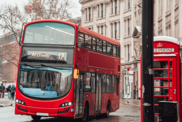 Important things to know London: This is an image of a bus winding through the streets of London going toward Archway.