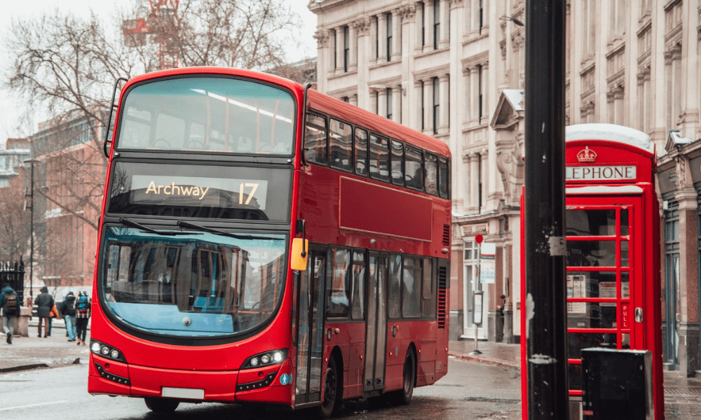 Important things to know London: This is an image of a bus winding through the streets of London going toward Archway.