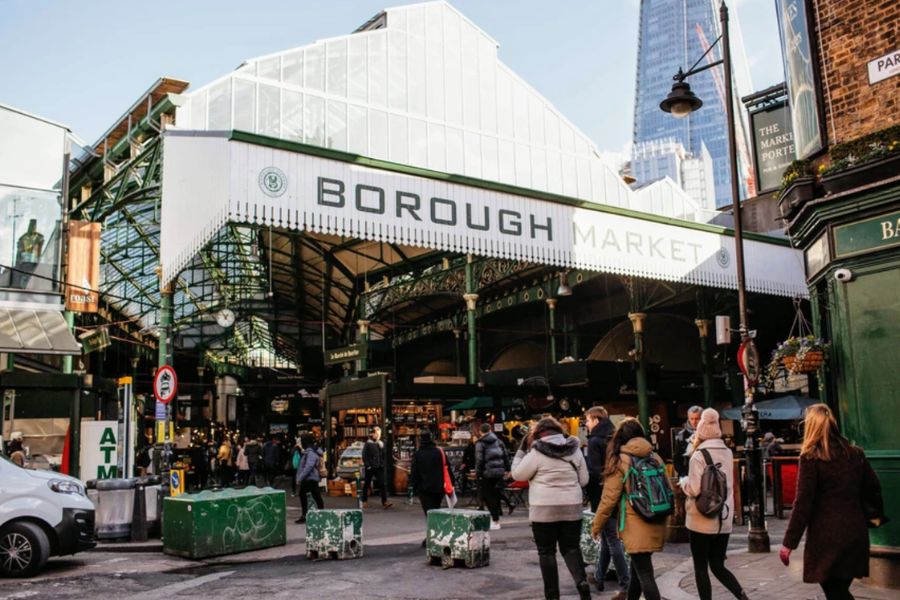 Entrance to Borough Market in London with the Shard skyscraper visible in the background