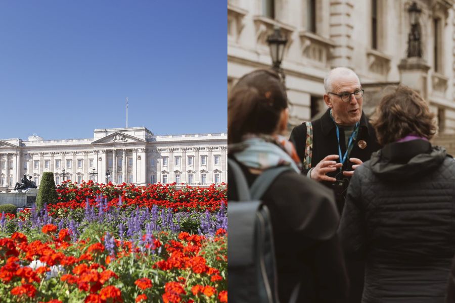Buckingham Palace framed by red and purple flowerbeds, alongside a tour guide speaking with visitors