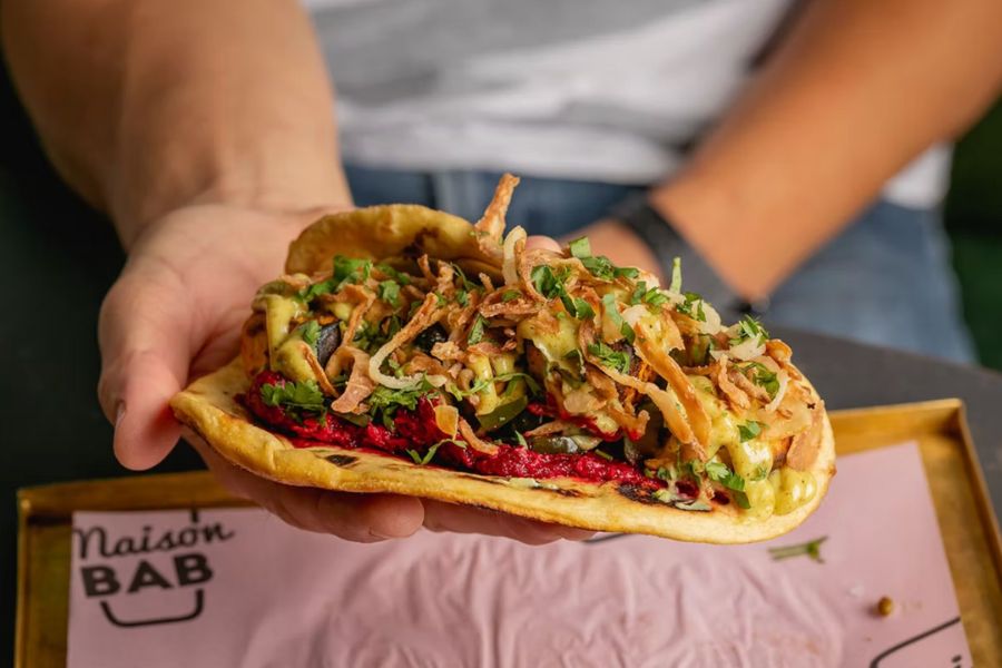 This is an image of a kebab with plenty of delicious fillings.