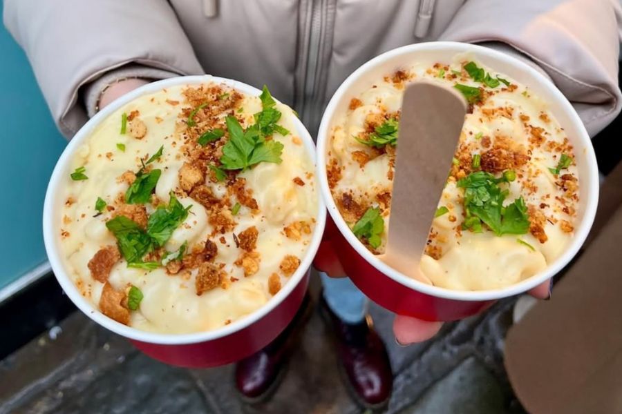 This is an image of two mac & cheese bowls with toppings.
