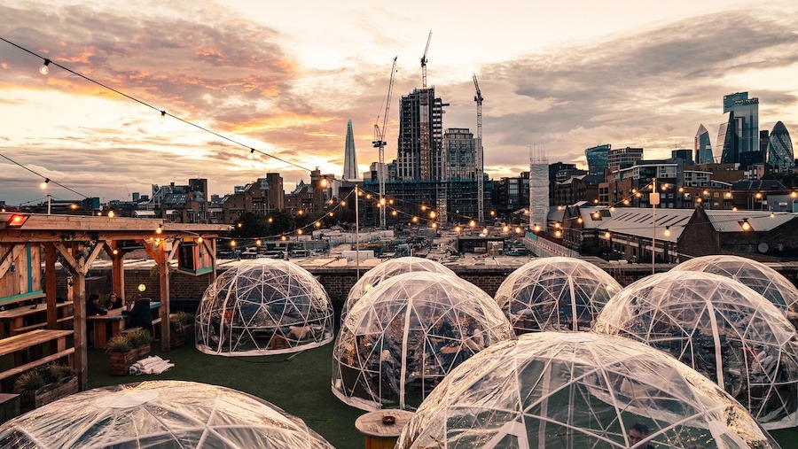Personal pods at the Skylights Roof Dock, overlooking the London skyline.