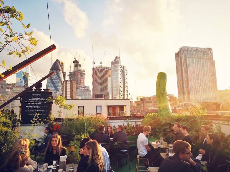 Enjoying your favourite drink with the view of the London skyline is one of the fun things to do in London in summer