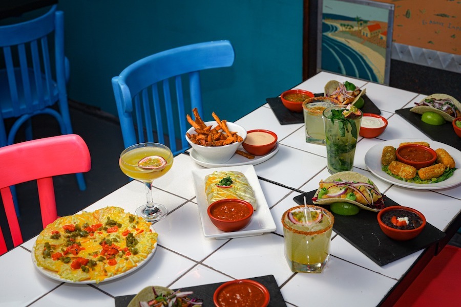 Cocktails, chips, and taco spreads being enjoyed in London in May