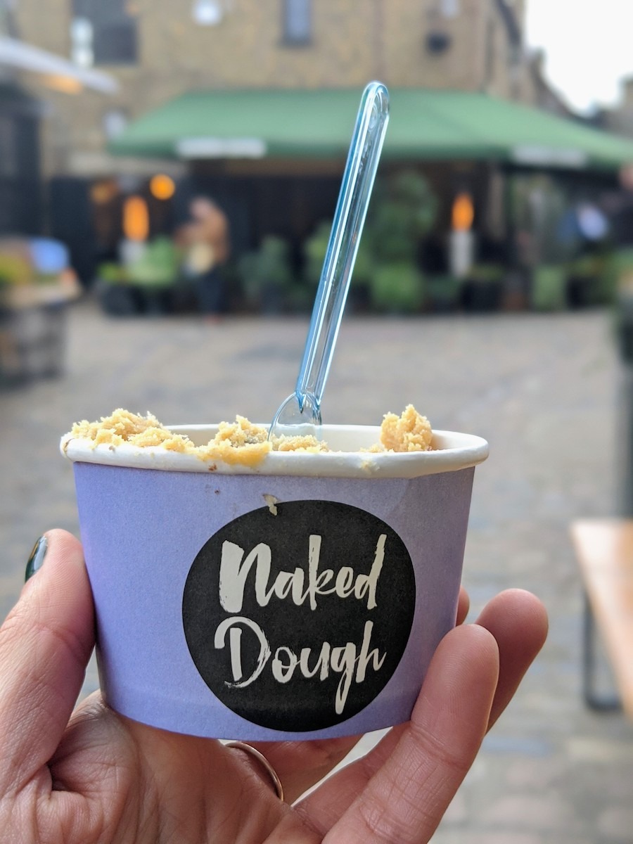 If you’ve ever wanted to eat raw cookie dough while baking, then head to this Camden Market stall called Naked Dough. You can get yummy, safe-to-eat cookie dough, complete with vegan options.