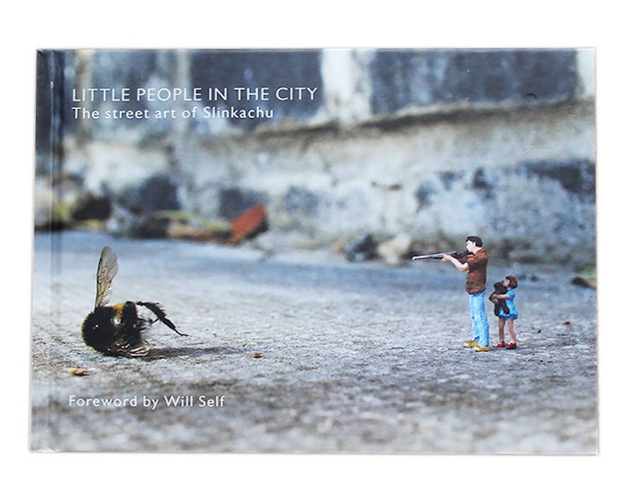 Street Artist Slinkachu presents London’s smallest corners in this quirky book, depicting the lives of the artist’s ‘little people’: tiny figurines of men, women, children, and even pets. And when I say tiny, I mean miniature! These mini characters live out mini scenes of normal, and not-so-normal life (e.g. a father defending his daughter from the vicious attack of a bumblebee!) in what might be the strangest of all the London themed coffee table books.