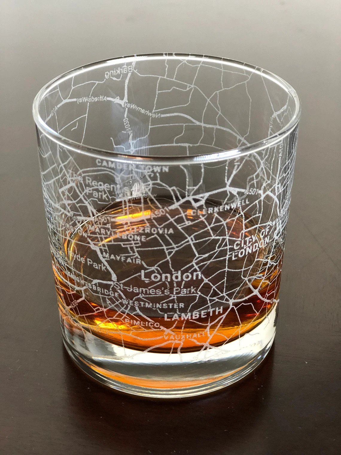 Map of London imprinted on a whiskey glass is one oof the quirkiest gift ideas for London lovers