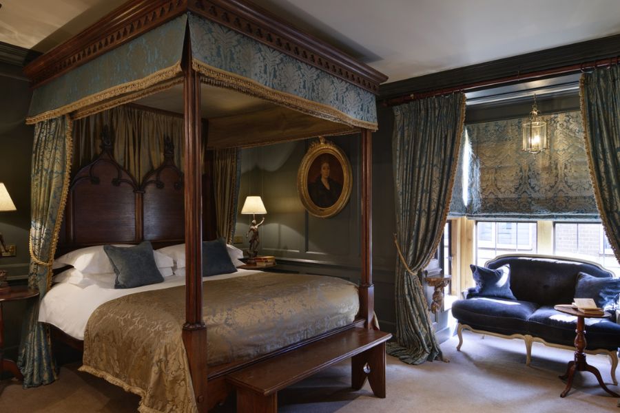 A four-poster bed with cosy interiors at Hazlitt's makes it one of the quirky hotels in London