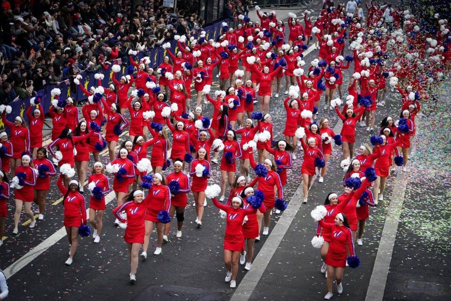 Women cheerleading at the London New Years Day Parade. Attending this event is one of the top things to do in London in January