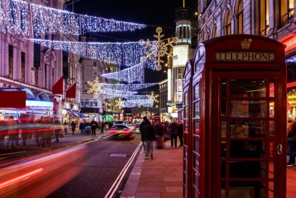 This is an image of Oxford Street in London all lit up for Christmas with lights strung from street to street.