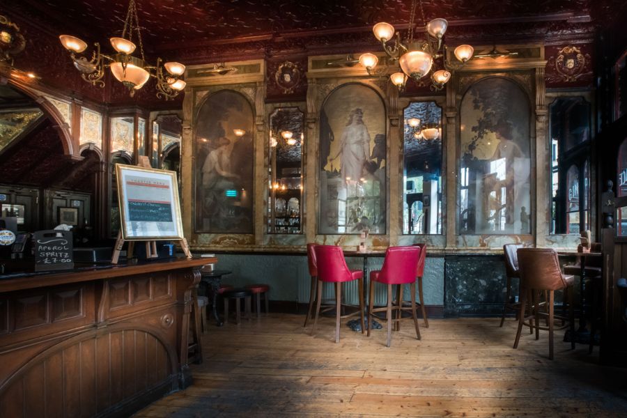 Have a pint and admire the interior design of some of the historic pubs in London.