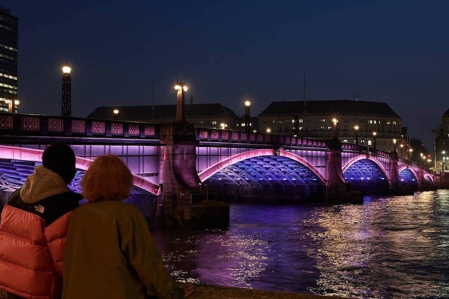 What To Do in London In February - visit the illuminated river project with a different illumination per bridge with free tours