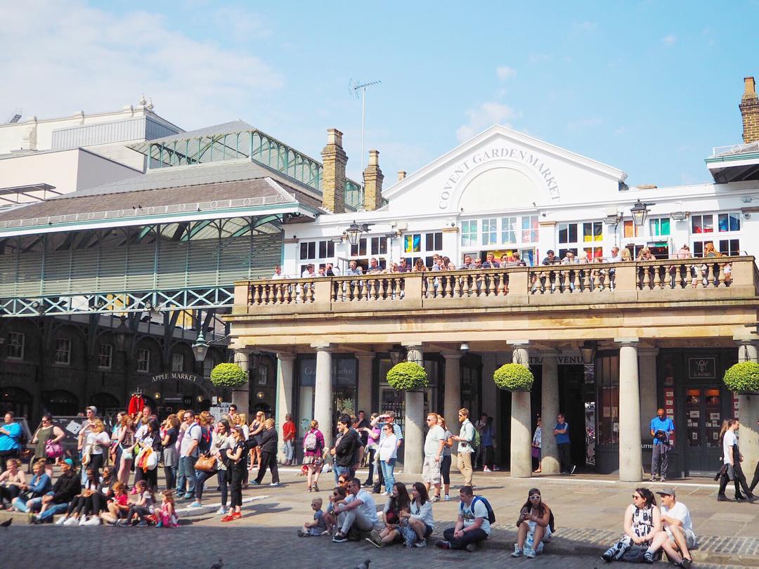 Visitors enjoying a sunny day at Covent Garden.