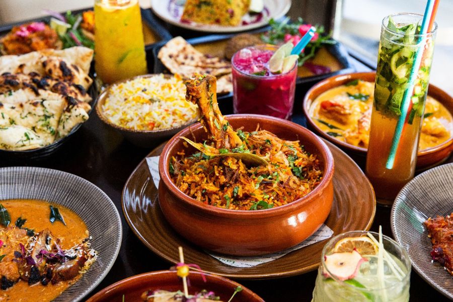 Indian food spread at Salaam Namaste; go for an unconventional meal in London on Christmas Day