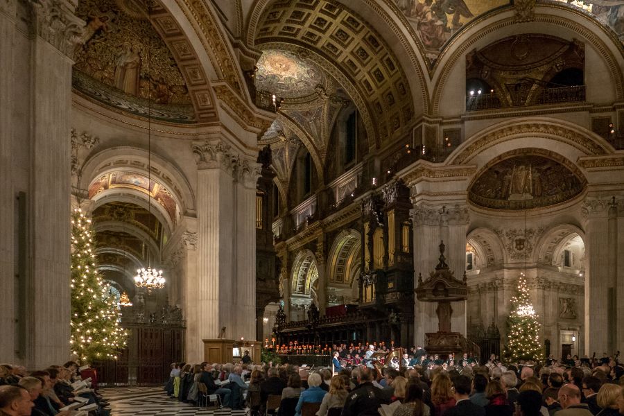 People attending the Midnight Mass at St. Paul's Cathedral; this is the best thing to experience London on Christmas Day