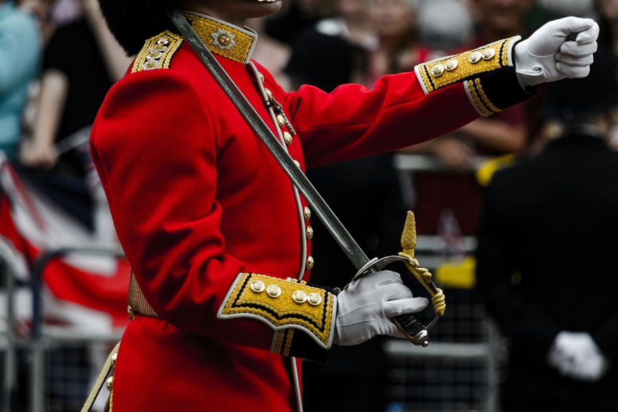 Yeoman-style guard in traditional red uniform at the Tower of London, one of the historic attractions included with the Explorer Pass.