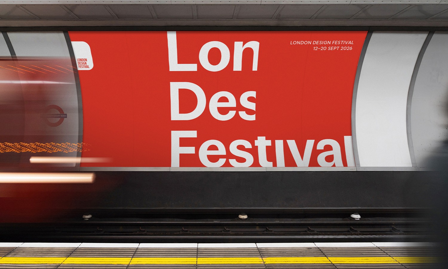 London Underground platform ad for the London Design Festival, 12–20 Sept 2026, with a red poster reading 'Lon Des Festival' partially obscured by a passing blurred train