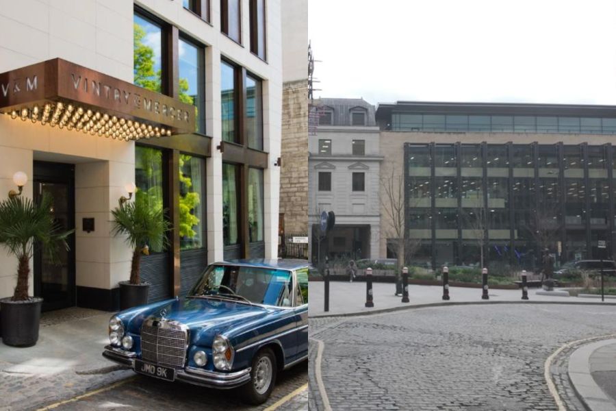 Exterior of Vintry & Mercer hotel in London, showing the illuminated marquee entrance sign with a vintage blue Mercedes-Benz parked on cobblestones outside, alongside a street view of the surrounding City of London architecture including a modern glass office building.